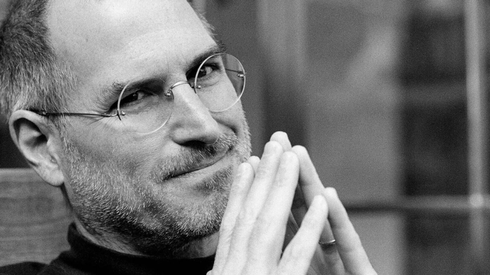Steve Jobs met randloze bril, symbool voor minimalisme